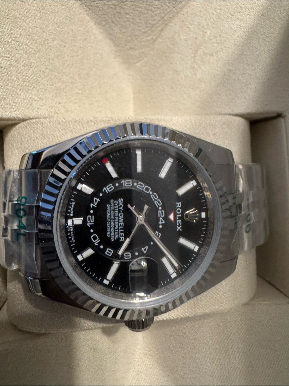 Rolex (inauthentic ) sky dweller stainless steel watch with black dial